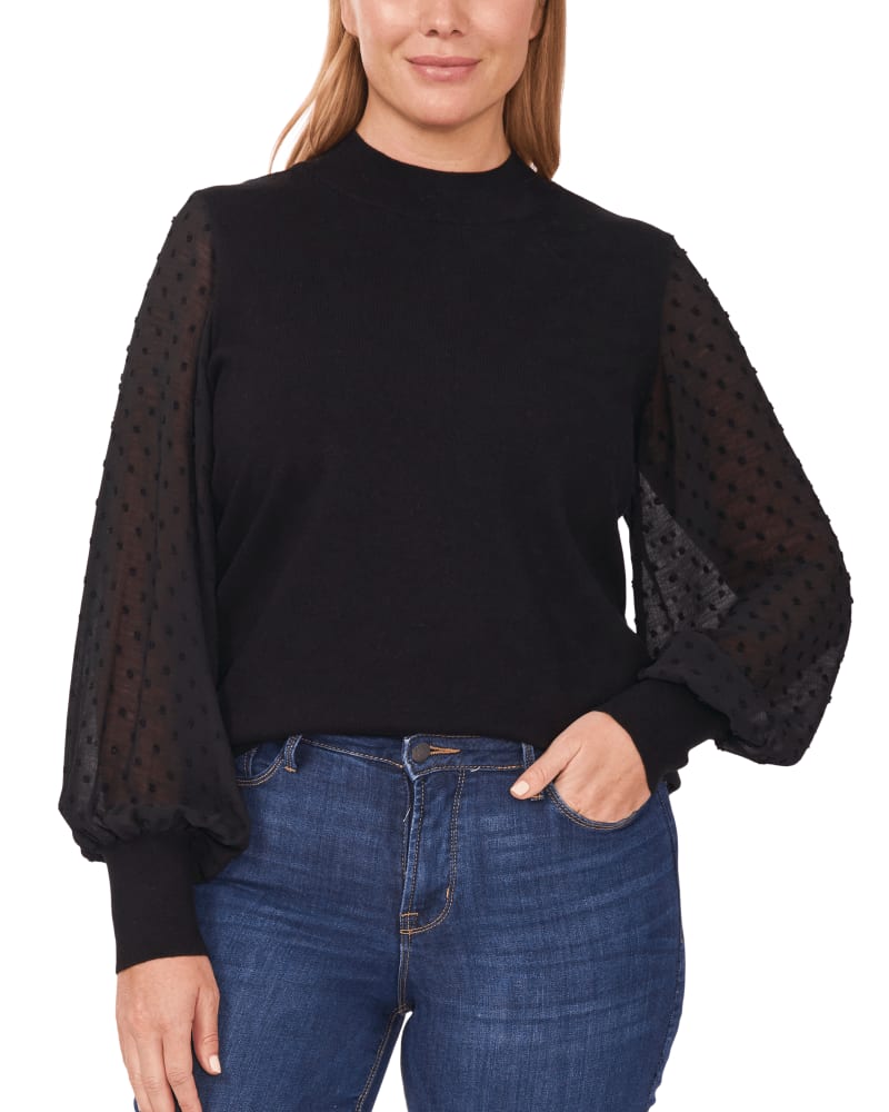 Front of a model wearing a size 1X Tori Mock Neck Sweater in RICH BLACK by CeCe. | dia_product_style_image_id:263488